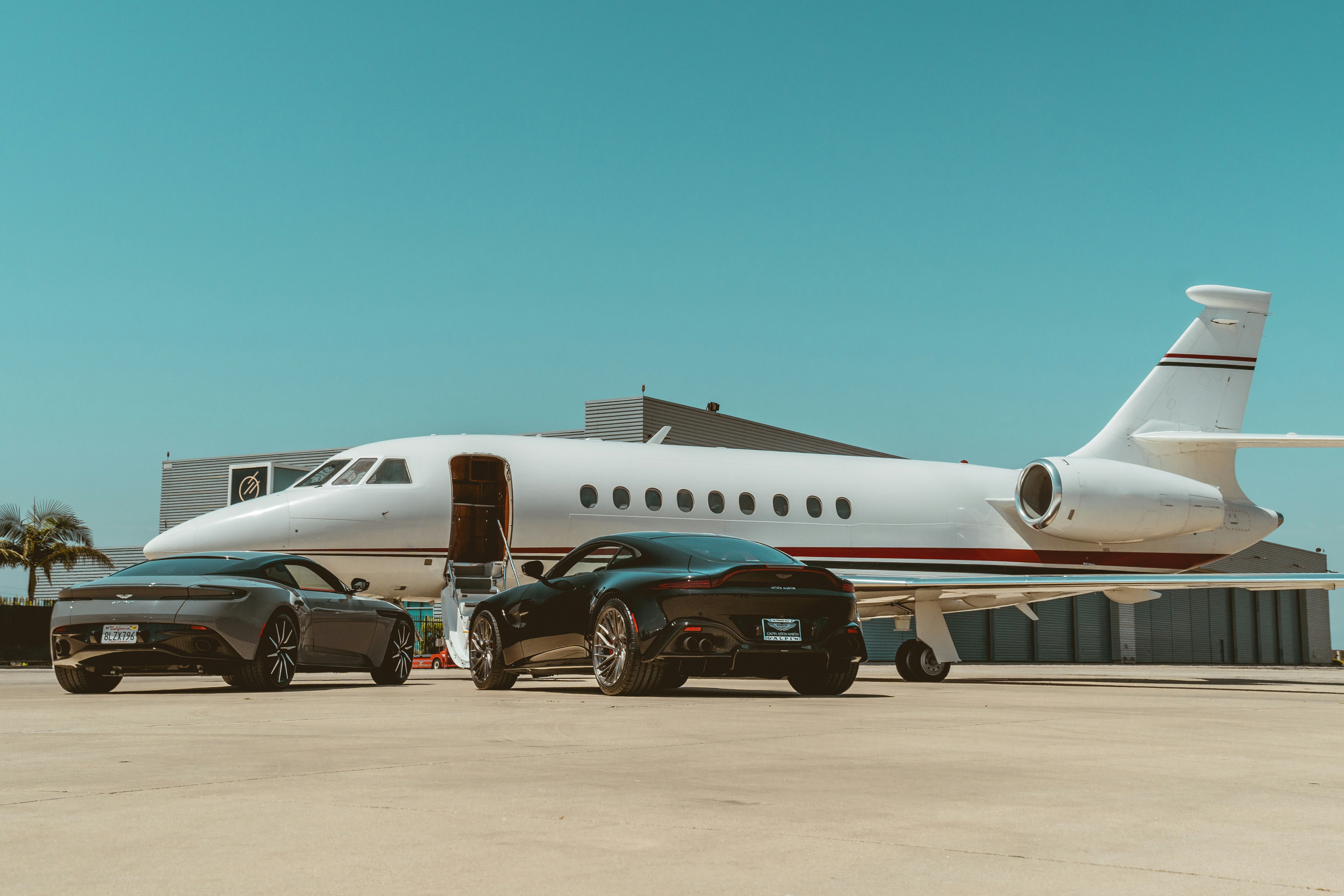 white passenger plane on airport during daytime
